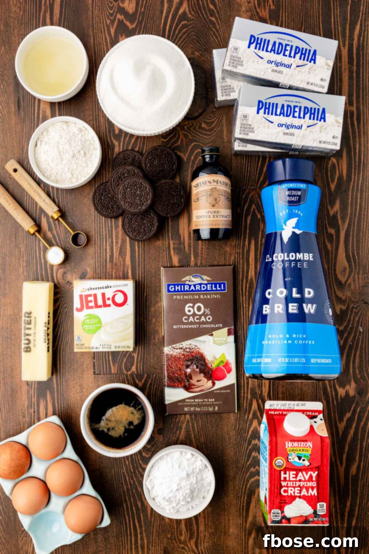 Gourmet Coffee Cheesecake 3 Overhead photo of ingredients on a wooden table to make coffee cheesecake.