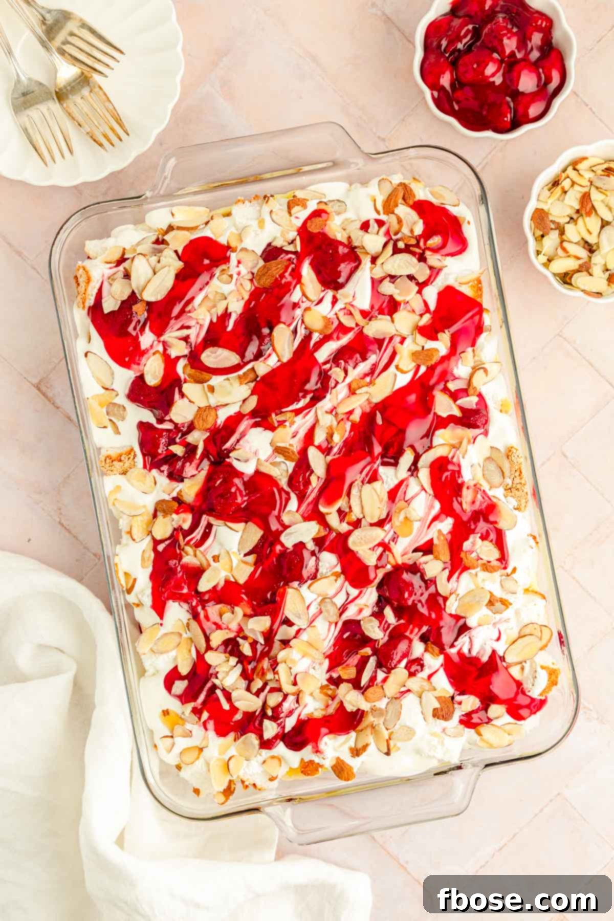 Overhead photo of a full pan of strawberry heaven on Earth cake, showcasing its vibrant layers and inviting appearance.