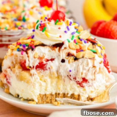 A slice of no bake banana split cake on a white plate.