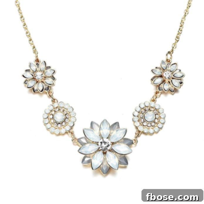 Elegant Gold Chain Rhinestone Lotus Statement Necklace, featuring a beautiful lotus design for a touch of refined sparkle.