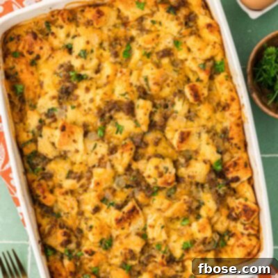 Overhead photo of Sausage Breakfast Strata on a green surface.