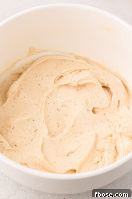 Irish cream frosting in a white bowl.