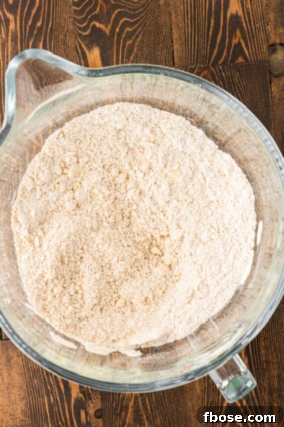 Dry ingredients to make apple cake in a bowl.