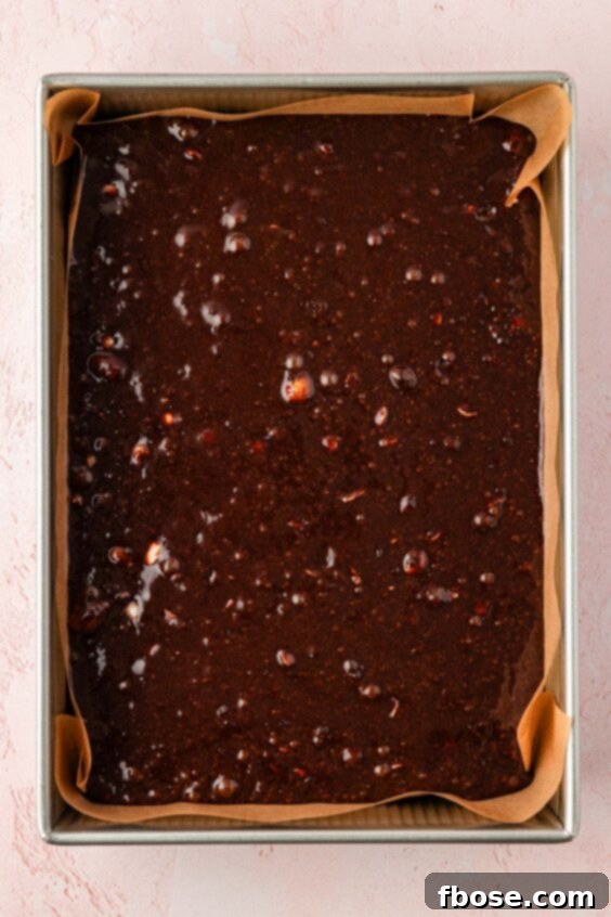 Molten Cadbury Egg Brownies 18 Brownie batter in a 9x13-inch baking pan.