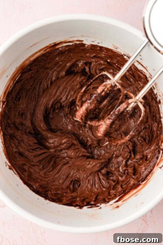Molten Cadbury Egg Brownies 20 Butter and cocoa creamed together in a bowl with a stand mixer.