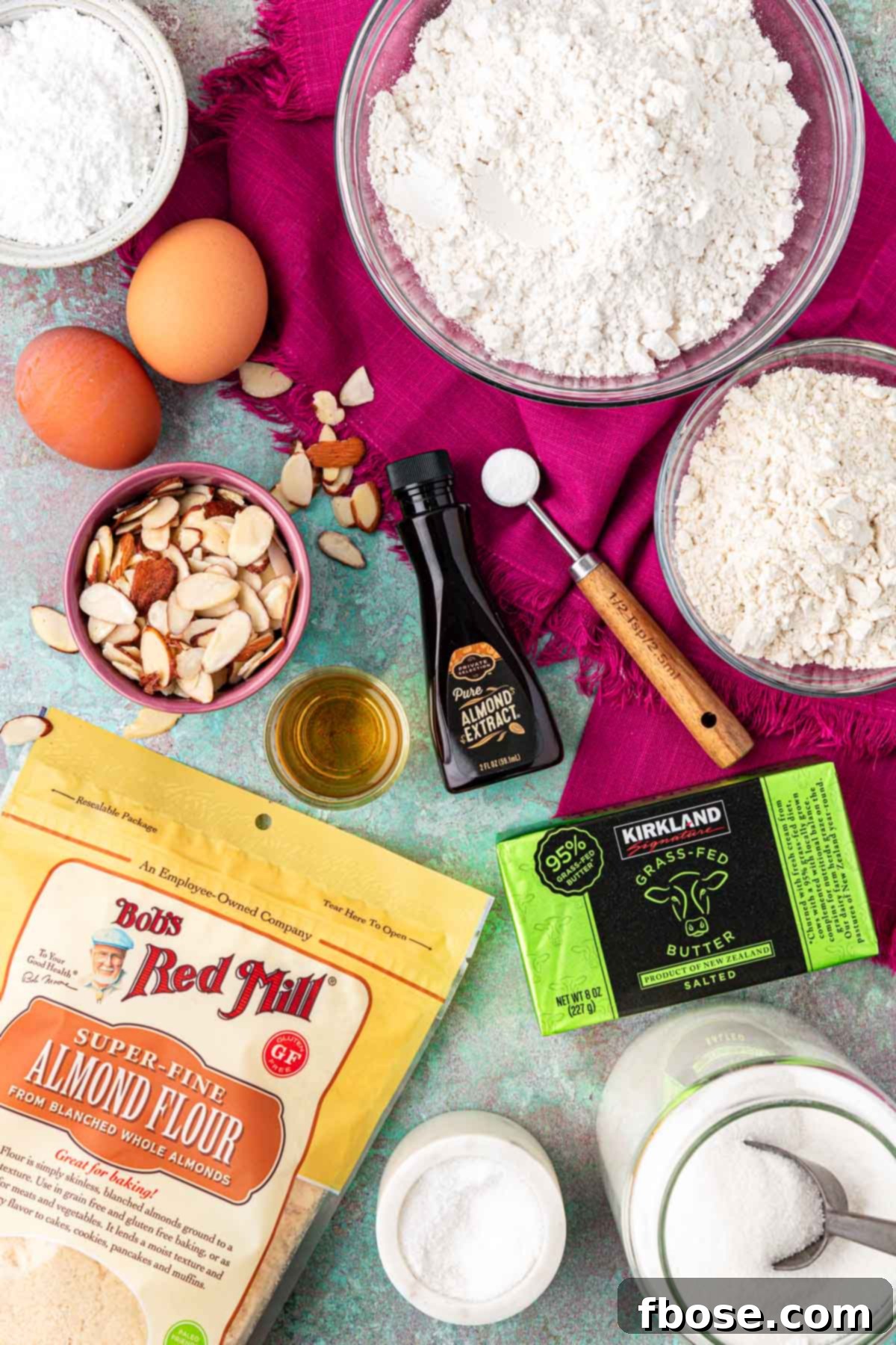 Flaky Almond Cookie Delights 3 Overhead photo of ingredients to make almond croissant cookies on a table.