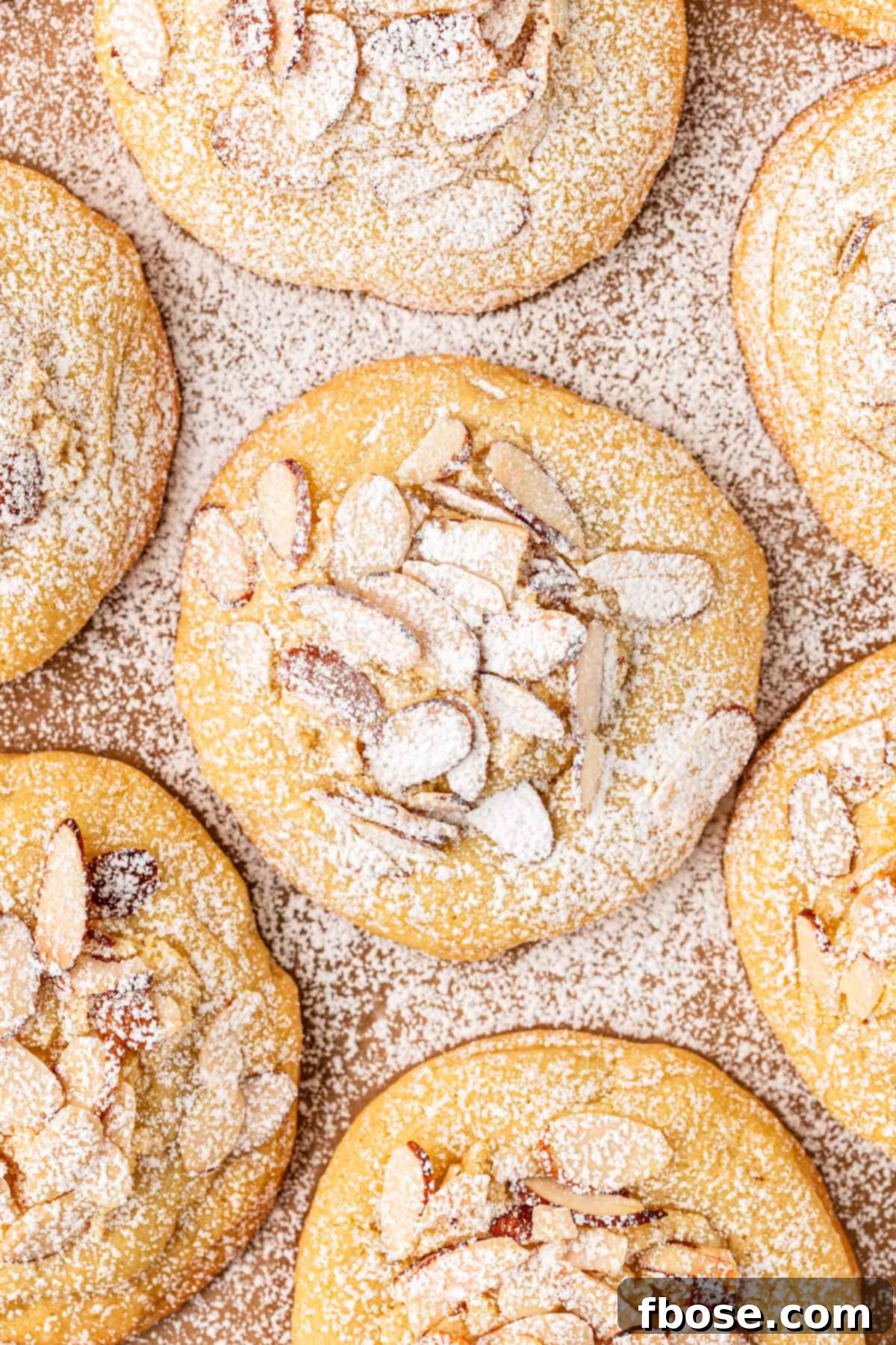 Flaky Almond Cookie Delights 5 Overhead of a pan of almond croissant cookies.