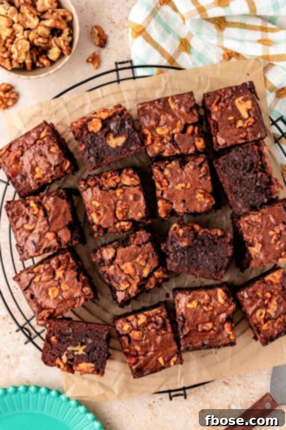Overhead photo of Walnut brownies slices on a wire rack.
