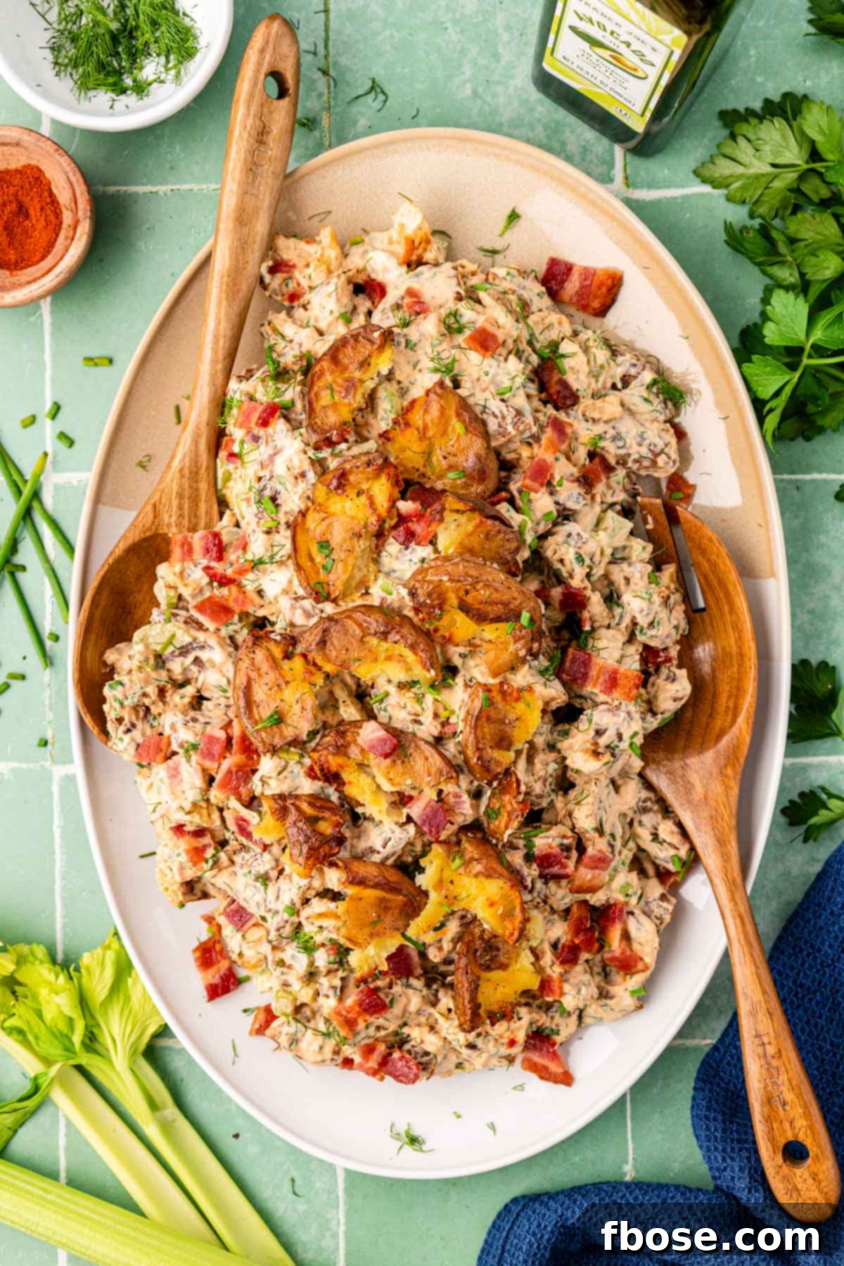 Overhead photo of a serving dish filled with crispy potato salad.
