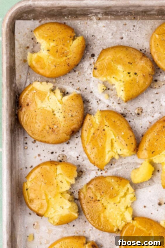 Smashed potatoes ready to be roasted.