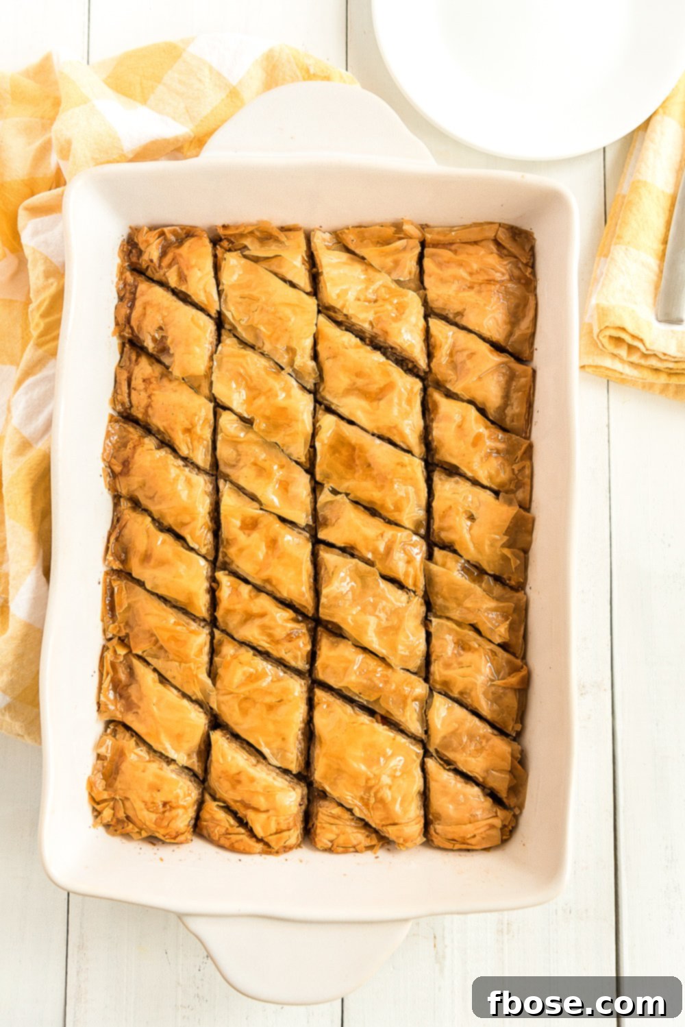 Effortless Homemade Baklava 5 Large baking dish filled with homemade baklava.