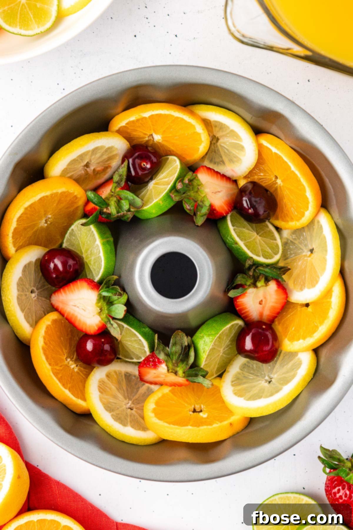 Fruit in a bundt pan ready to make an ice ring.