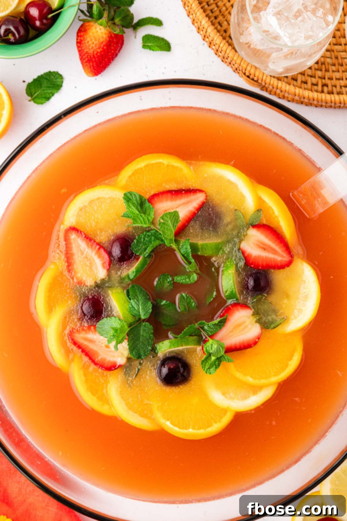 Overhead photo of a bowl of fruity party punch.