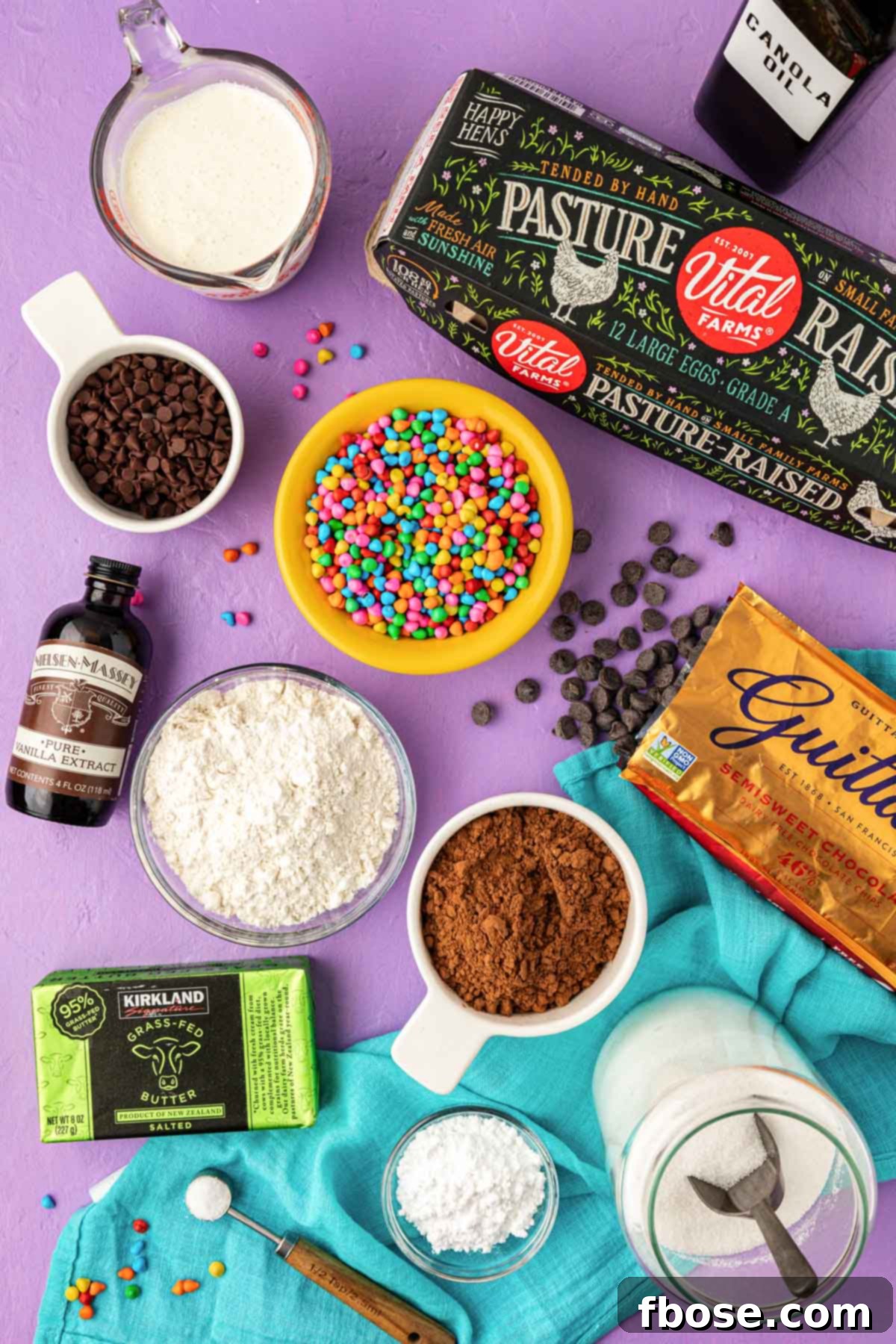 Overhead photo of ingredients to make homemade Cosmic Brownies laid out on a table.