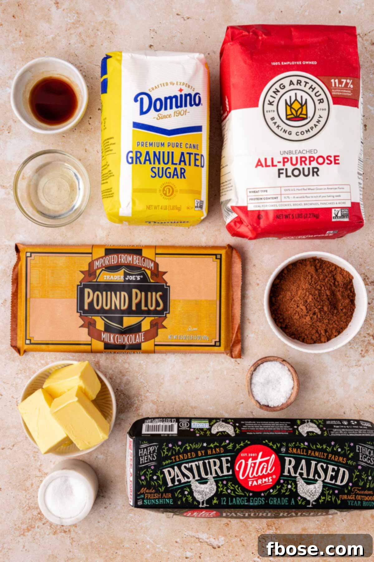 Ingredients to make chocolate chunk brownies on a table.