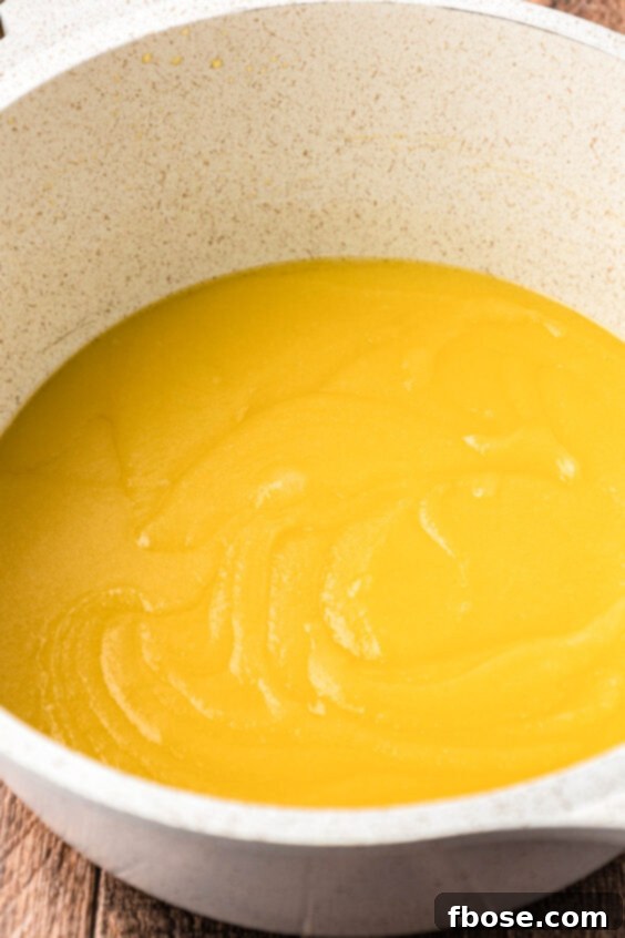 Butter and sugar melted in a pot.