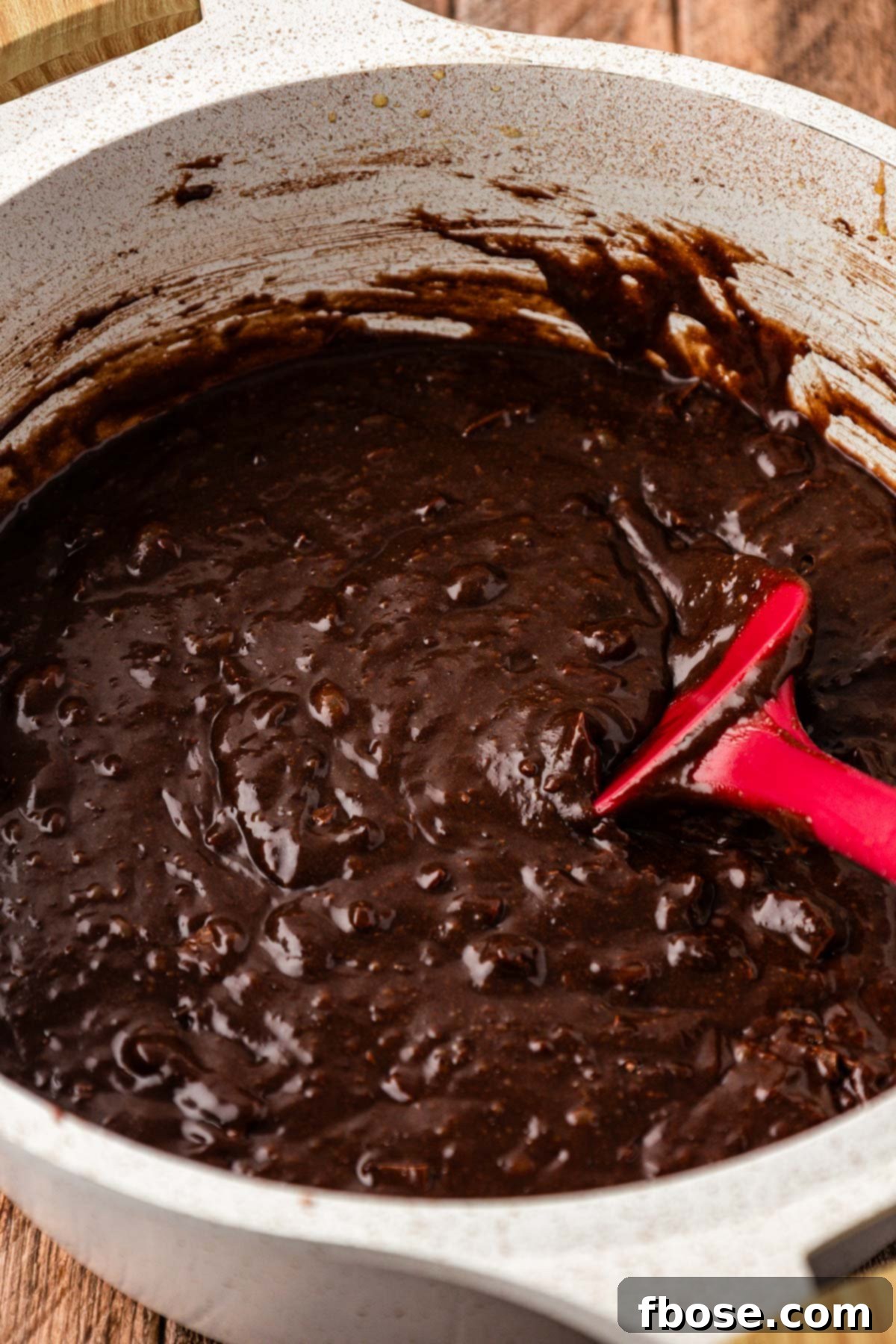 Brownie batter in a pan.