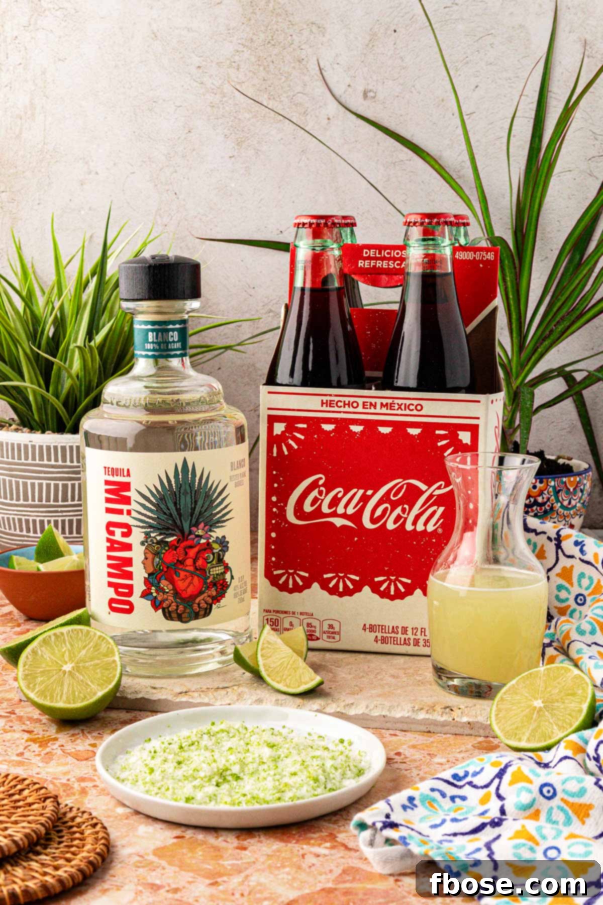 Ingredients to make a Batanga cocktail on a table.