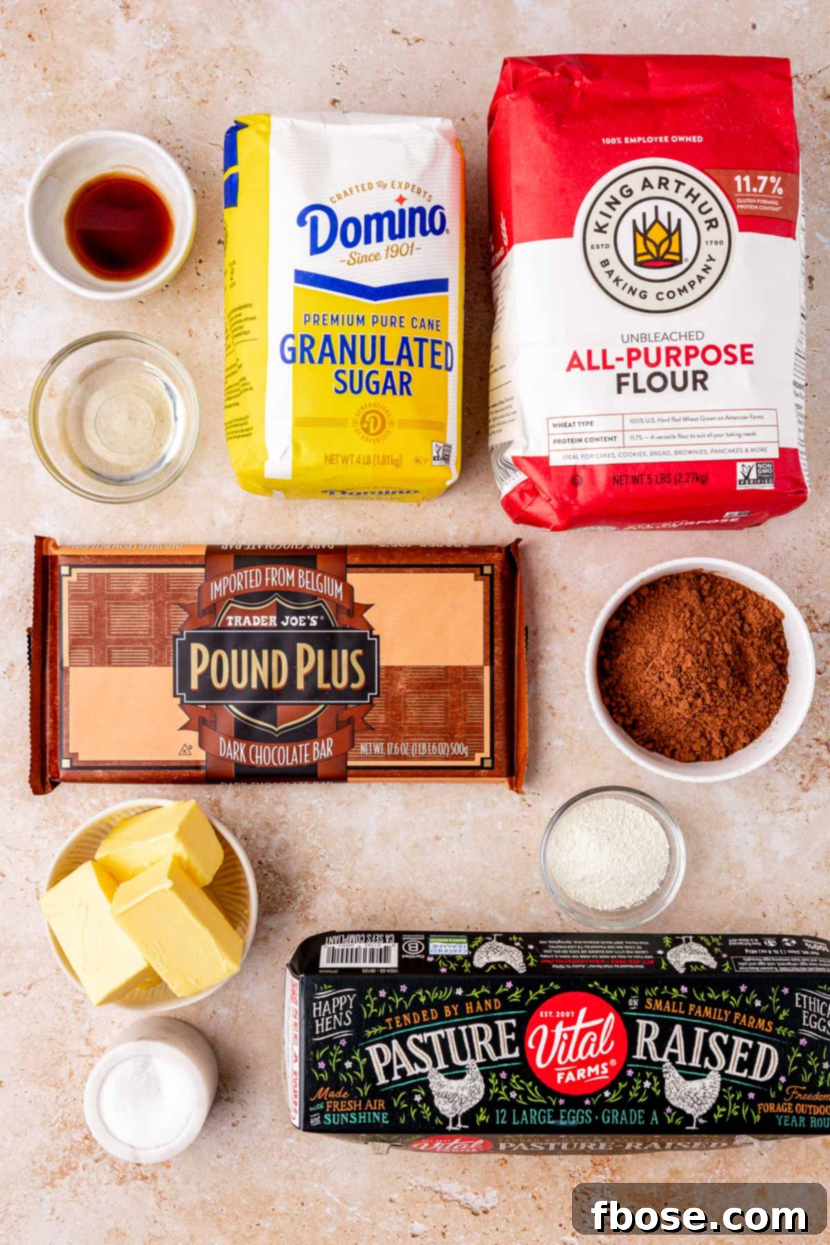 Ingredients to make sheet pan brownies on a table.
