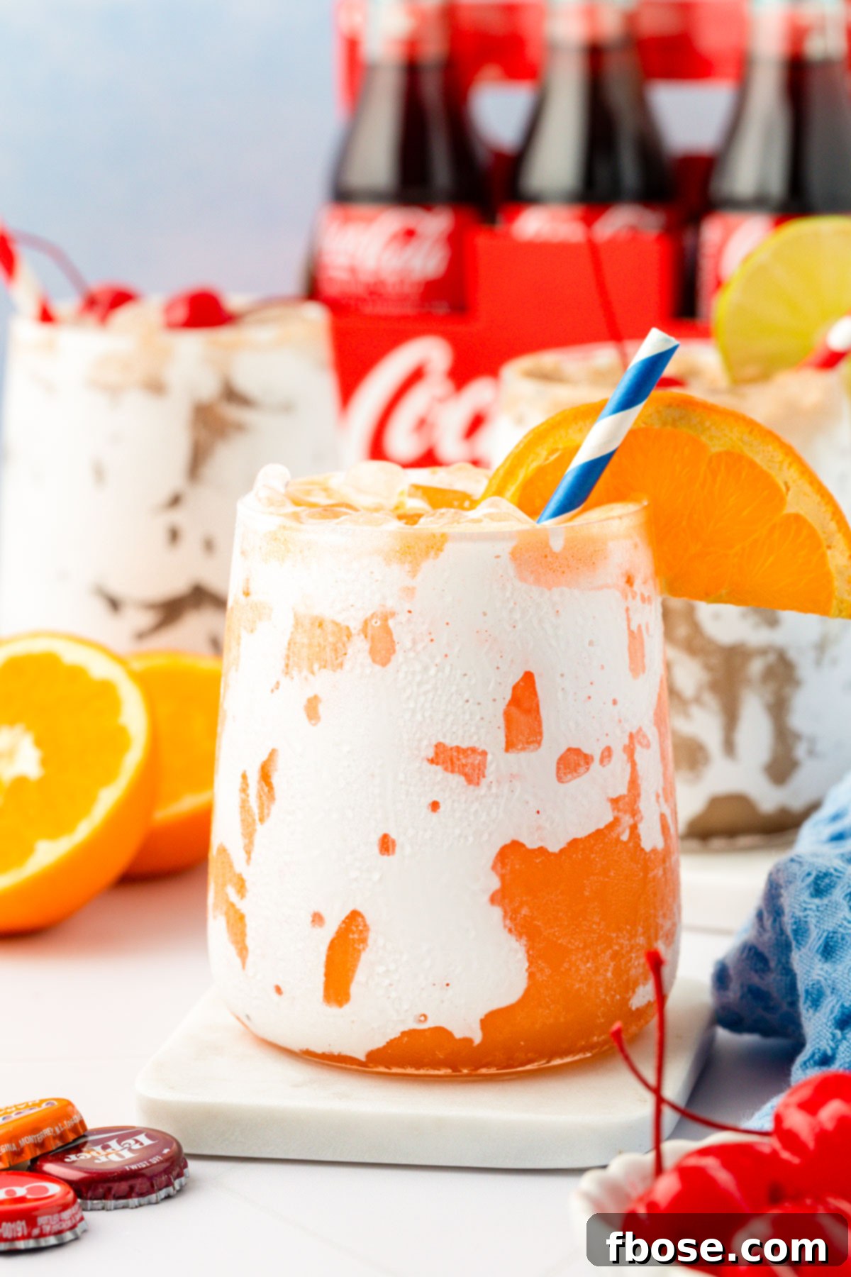 Close up of three glasses on fluffy soda.