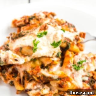 Turkey Florentine pasta bake served on a white plate.
