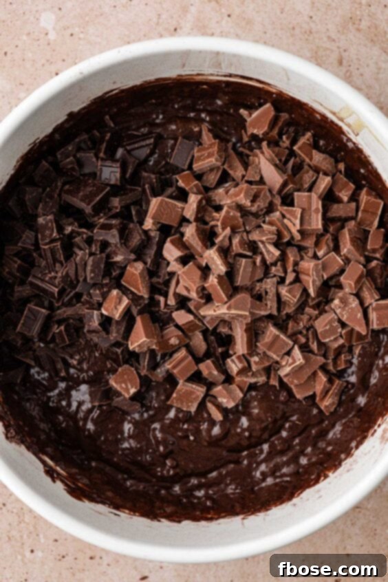Chopped chocolate ready to be folded into chocolate muffin batter.