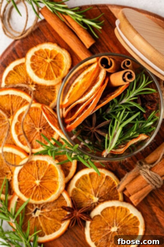 Dried orange slices and other supplies to make holiday decor.