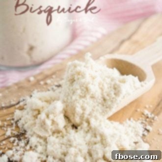 Homemade Bisquick mix in a bowl with baking utensils