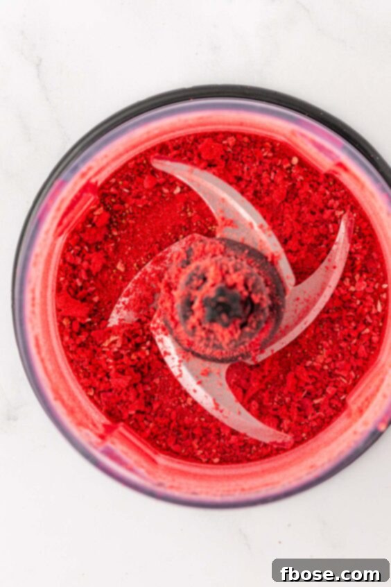 Freeze dried strawberries that have been pulsed in a food processor.