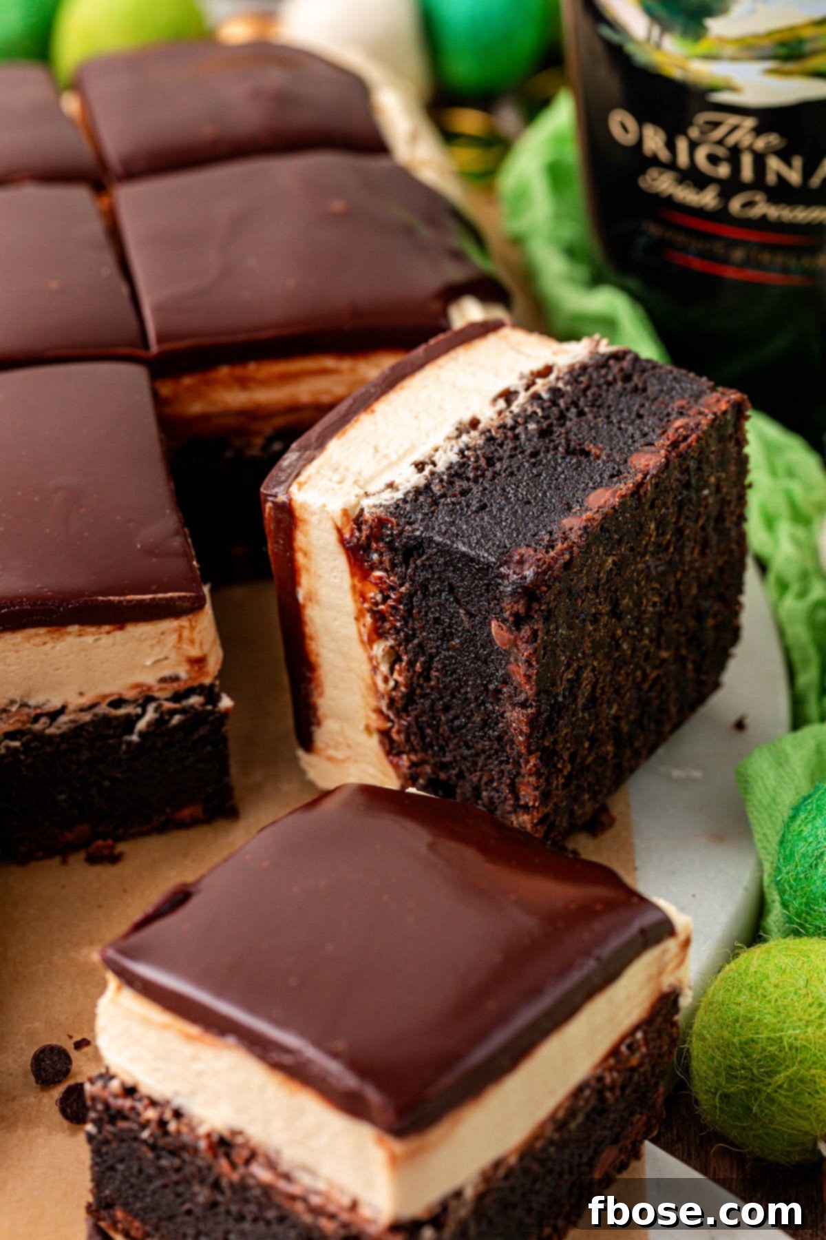 Close up of brownies with irish cream frosting and ganache.