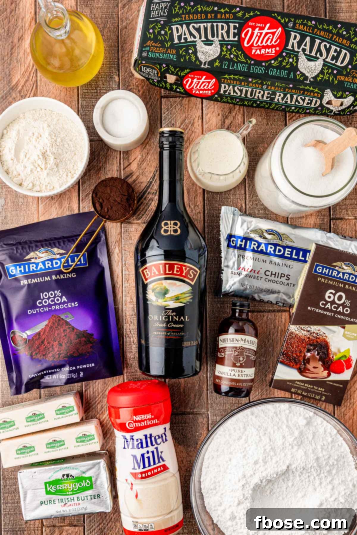 Overhead photo of ingredients to make Bailey's Irish Cream Brownies on a wooden table.