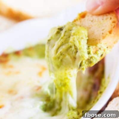 This Baked Spinach Artichoke Dip is a must have at any party. With two different prep methods, you can make it either hearty or creamy!