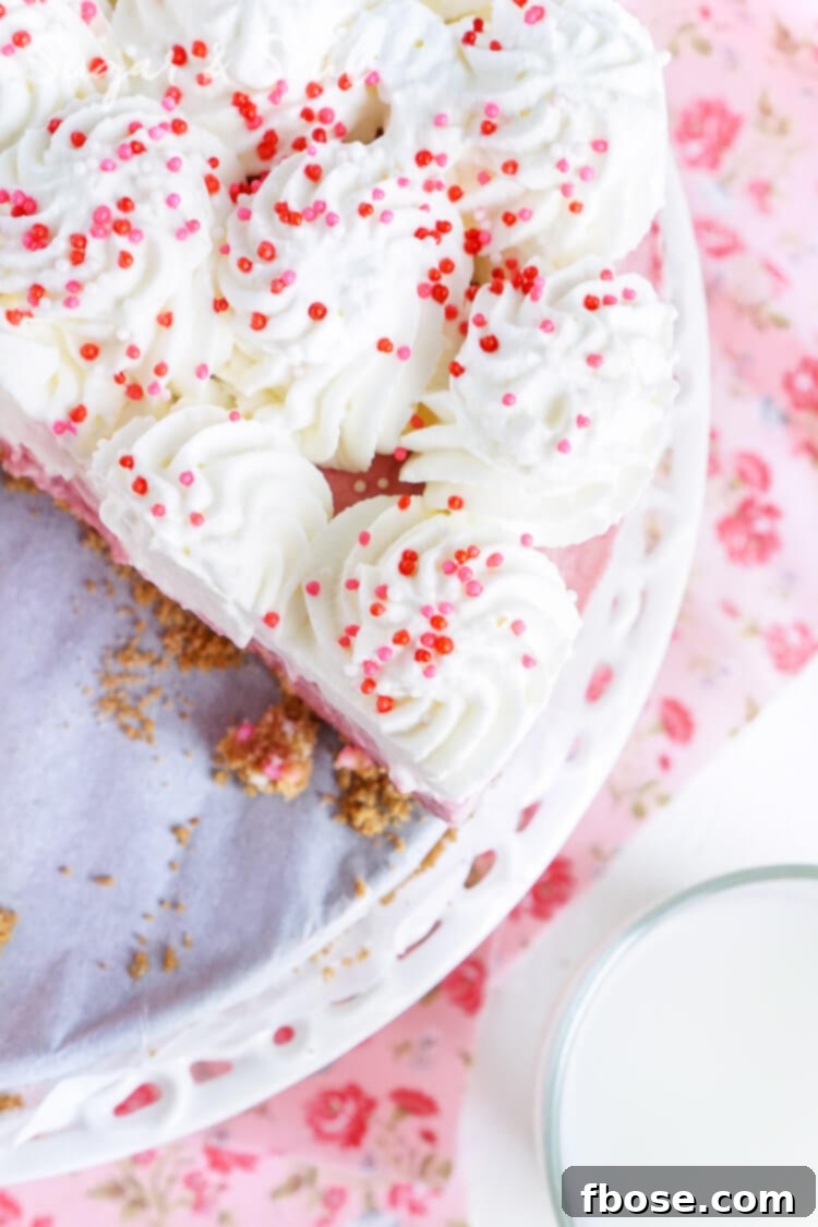 This No Bake Raspberry Cheesecake is light and creamy and loaded with tart raspberries!
