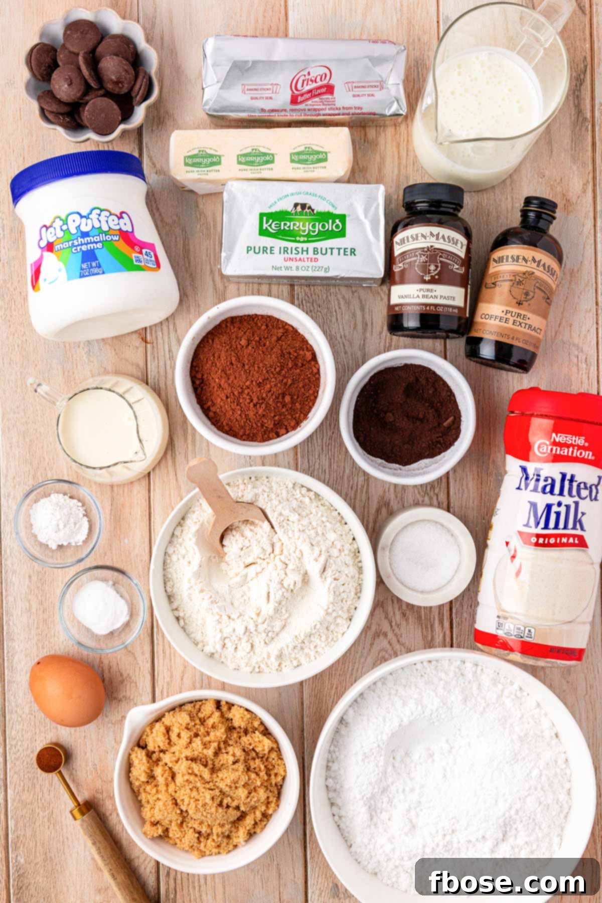 Ingredients to make whoopie pies out on a wooden tables.