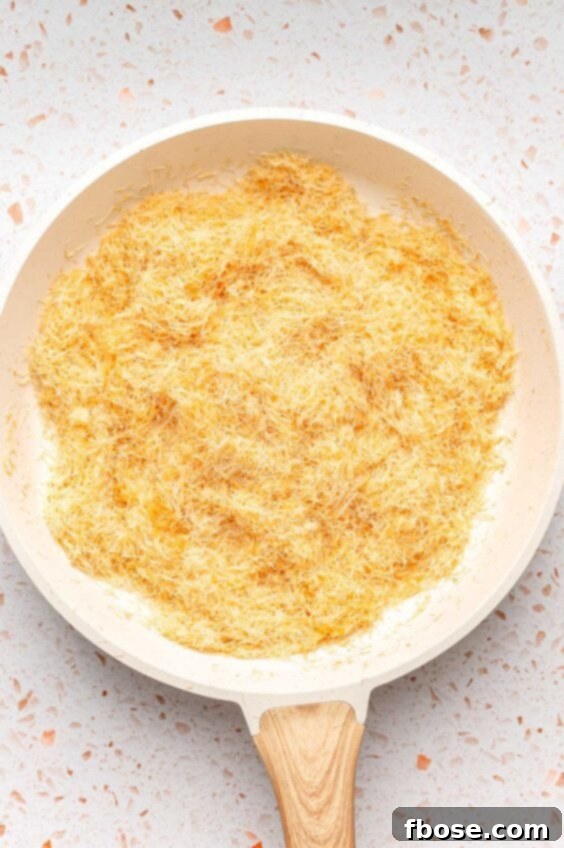 Toasted kataifi in a skillet, showcasing its golden color.