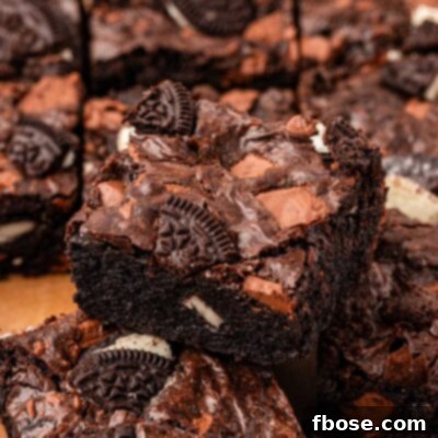 Oreo brownies on a piece of parchment paper.