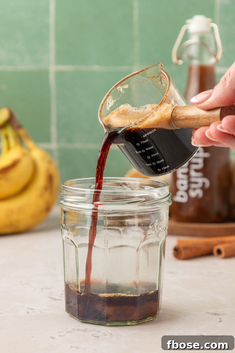 Add espresso to the glass.